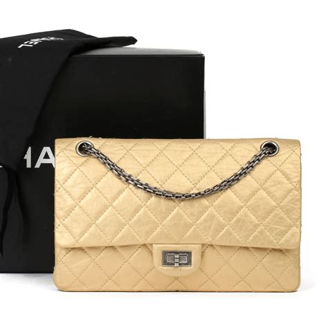 chanel reissue 226 gold hardware|Chanel 2.55 reissue bag.